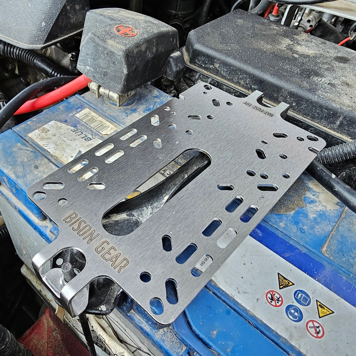 On Battery Fuse Bracket - Bison Gear
